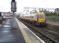 Scene at Motherwell station on 2 January 2008. Unit 334006 waits at platform 4, having recently arrived from the Hamilton side of the circle.<br><br>[John McIntyre 02/01/2008]