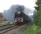 71000 <I>Duke of Gloucester</I> brings a southbound charter from <br>
Carlisle towards Bamber Bridge before joining the WCML at Farington Junction in the late afternoon of a rather dull 21 May 2011. The lighting conditions were not helped by the volumes of thick black smoke coming from the locomotive. <br>
whilst it was coasting downhill.<br>
<br><br>[John McIntyre 21/05/2011]