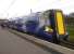 380009 glides to a halt at Ardrossan South Beach on 26 May with the 13.11 Largs - Glasgow Central.<br><br>[Ken Browne 26/05/2011]