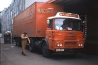 A daily early-morning scene alongside Inverness Parcels Depot in the mid-1970s - parcels and mail off the 04.45 overnight arrival from Glasgow and Edinburgh, now transferred to 'BRUTEs' ready to be loaded into the Macbrayne's lorry bound for the Ullapool-Stornoway ferry.<br>
<br><br>[Frank Spaven Collection (Courtesy David Spaven) //]