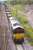 DBS 66025 leaves Millerhill with the 6S58 Lackenby - Dalzell loaded slab train on 20 June.<br>
<br><br>[Bill Roberton 20/06/2011]