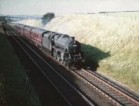 Black 5 no 44727 with an up passenger train south of Lugton on 28 August 1959.<br><br>[A Snapper (Courtesy Bruce McCartney) 28/08/1959]