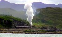 The returning 'Jacobite' pulls away from Mallaig on 28 July with 45231 in charge. Taken from my luxury yacht - well, MV 'Lochnevis' of Calmac returning from Eigg.<br><br>[Colin Miller 28/07/2011]