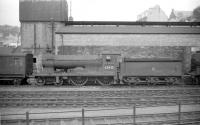 Standing in the shed yard at Hawick on 28 June 1958 is Scott class 4-4-0 no 62425 <I>'Ellangowan'</I>. At this point the locomotive had 2 months left before official withdrawal by BR.<br><br>[Robin Barbour Collection (Courtesy Bruce McCartney) 28/06/1958]