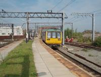 A Rose Hill bound service, formed by Pacer 142005, hurries through Ardwick in East Manchester, as do most trains on this busy line. In the 2011 timetable four Manchester bound trains are scheduled to call here in a morning and two Marple line services in the evening (Mon to Fri only). The station was recently proposed for closure but reprieved as it is in a development area and more traffic is possible in the future.<br><br>[Mark Bartlett 03/08/2011]