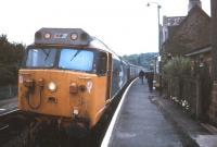 A class 50 with a 3-coach train stops at Eggesford, on the Barnstaple line during a DMU shortage in August 1990.<br><br>[Ian Dinmore 03/08/1990]