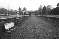 On the other side of the camera for a change. The rarely photographed Frank Spaven surveys the remains of Comrie station at Easter 1966 in this view from the west. The railway to Crieff and Gleneagles had closed in 1964, but the track appears to have been lifted only recently.<br>
<br><br>[David Spaven //1966]