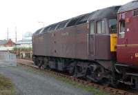 WCRC Class 47 no 47786 <I>Roy Castle OBE</I> in the sidings west of Dundee station with railtour stock on 15 April 2011. In the left background are the masts of the RRS 'Discovery'.<br><br>[John McIntyre 15/04/2011]