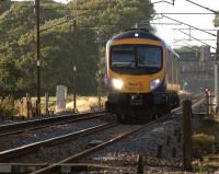 On the long straight through the site of the former Brock station, <br>
an Edinburgh to Manchester Airport service is approaching the foot <br>
crossing on the evening of 8 August 2011.<br><br>[John McIntyre 08/08/2011]