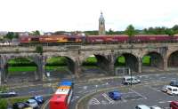 DBS 66131 crosses Kilmarnock Viaduct with 4S84 Milford to Greenburn empty hoppers on 17 August. It will shortly run round in the Long Lyes before returning south to reach its destination.<br><br>[Ken Browne 17/08/2011]