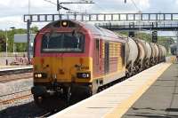 67030 passing through Cardonald on 23 June with a short consist of tanks from Mossend to Dalry<br><br>[Graham Morgan 23/06/2011]