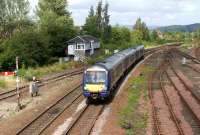 A southbound service in the hands of 170428 passes Stirling North <br>
signal box on the approach to Stirling station on 20 August 2011. <br>
<br><br>[John McIntyre 20/08/2011]
