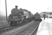 BR Standard class 3 2-6-2T no 82005 with a train at Dovey Junction in August 1962.<br><br>[K A Gray 14/08/1962]