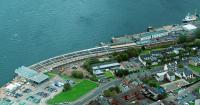 Alterations to Gourock station seen in an aerial view on 29 August 2011. The trainshed canopy has been cut back to the circulating area and the remaining section re-glazed. A new station building has been built by the trainshed.<br><br>[Ewan Crawford 29/08/2011]