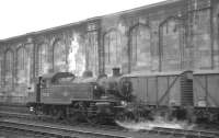 Ivatt 2-6-2T no 41222 is station pilot at Carlisle on 14 August 1965, seen here shunting the sidings on the west side of the station. [This push-pull fitted locomotive had arrived at Upperby shed around 6 months earlier, having been used on the Newport Pagnell branch until its closure the previous year.]<br><br>[K A Gray 14/08/1965]