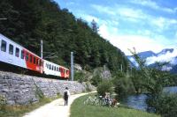 An OBB electric train deep in the Salzkammergut mountains in 2002 - between Obertraun-Dachsteinhoehlen and Hallstatt on the scenic single-track route from Stainach Irdning (on the Vienna-Innsbruck route) to Attnang Puchheim (between Vienna and Salzburg). Pause for breath.<br>
<br><br>[David Spaven //2002]