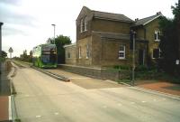 This station, on the former Huntingdon-Cambridge line, has been converted to a private home named 'Gresley House'. The whirring sound you hear is Sir Nigel himself, spinning in his grave, as a double decker bus heads for Cambridge on 10 September along the new Guided Busway.<br><br>[Ken Strachan 10/09/2011]