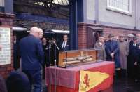 A ceremony taking place at Gourock on 31 May 1969 with the presentation of a model of a steamer from the Caledonian Steam Packet Company. In the background a Blue Train stands at the platform and behind the camera is TS <I>Duchess of Hamilton</I> on a charter to Brodick via the Kyles of Bute.<br>
<br><br>[John McIntyre 31/05/1969]