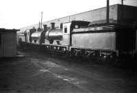 A pair of J36 0-6-0s, nos 65253 + 65323, standing alongside Dunfermline shed on a quiet looking Wednesday afternoon in February 1959.<br><br>[Robin Barbour Collection (Courtesy Bruce McCartney) 11/02/1959]