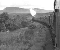 Black 5 no 44785 heads south from Kildonan on 7 September 1960 with the afternoon train from Wick to Inverness. The photographer had joined the train at Georgmas Junction, having arrived there off an earlier connection from Thurso [see image 28876].<br><br>[K A Gray 07/09/1960]