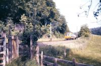 A DMU approaching Home Farm Crossing near Eggesford in July 1986.<br><br>[Ian Dinmore /07/1986]