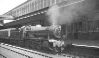 Ex-GWR Hall class 4-6-0 no 4993 <I>Dalton Hall</I> waits with a train at Exeter St Davids in August 1961.<br><br>[K A Gray 17/08/1961]