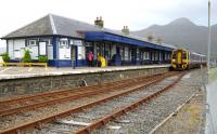 The station at Kyle of Lochalsh, the building redolent of WHR station design, with a DMU waiting to depart with a service to Inverness on 21 September.<br><br>[Alistair MacKenzie 21/09/2011]
