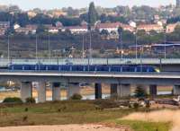 Crossing the River Medway on HS1, a South Eastern Class 395 Javelin set heads for St Pancras on 26 September 2011. On the far side of the railway viaduct is the M2 motorway.<br><br>[John McIntyre 26/09/2011]