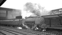 Stanier Coronation Pacific no 46251 <I>City of Nottingham</I> stands at Carlisle on 25 April 1964 with the 10.5am Glasgow Central - Birmingham New Street.<br><br>[K A Gray 25/04/1964]