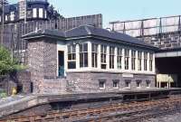 The signal box located on the northbound platform of the long closed (1947) station at Easter Road, seen here in the spring of 1971 looking towards Granton. Easter Road itself passes above the line immediately beyond the box.<br>
<br><br>[Bill Jamieson //1971]