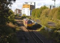 DBS 67011 returns light from Powderhall to Millerhill at the former  Lochend Junction on 11 October 2011. Here lines diverged left to Abbeyhill and right to Leith Central.<br><br>[Bill Roberton 11/10/2011]