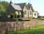 The former station at Cliburn on the Eden Valley line between Appleby and Penrith. The station closed to passengers in September 1956 and is seen here 50 years on, having been adapted as a private residence.<br><br>[John Furnevel 11/05/2006]