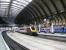 That roof again... York on 29 June 2011 with a Reading - Newcastle Central CrossCountry service arriving at platform 5 alongside a Northern DMU for Leeds via Harrogate awaiting its departure time in bay platform 8.<br><br>[John Furnevel 29/06/2011]