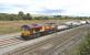 DBS 66116 heading west towards Didcot on 11 August 2011 in the process of restarting following a red signal. Note the 'heavy lift' Balfour Beatty crane in the consist.<br>
<br><br>[Peter Todd 11/08/2011]