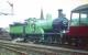 Scene in the sidings to the south of Lockerbie station on 13 June 1959 where ex-Great North of Scotland Railway 4-4-0 No 49 <I>Gordon Highlander</I>, has just run round its train. The train in question is the SLS <I>Golden Jubilee Special</I> from Glasgow Buchanan Street, which the locomotive will next take (observation car first) on to Dumfries via the Lochmaben line. The special will later return north from Dumfries via the G&SW route to St Enoch. Note the spire of St Cuthbert's Church in the background, still a landmark to this day, although the surroundings have changed beyond recognition [see image 35141].  <br>
<br><br>[A Snapper (Courtesy Bruce McCartney) 13/06/1959]