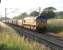 66098 heads the thrice weekly 6V71 Hardendale (Shap) to Margam lime train south along the WCML at Woodacre on a sunny evening in July 2011. <br><br>[Mark Bartlett 27/07/2011]