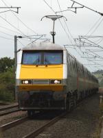 91109 approaching West Goswick Farm LC at the head of a Northbound East Coast service in July 2011. The location is just a little South of the former Goswick Station.<br><br>[Graham Morgan 26/07/2011]