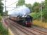 Running south towards Barton and Broughton on the WCML on 15 August 2011, Britannia Pacific no 70013 <I>Oliver Cromwell</I> makes easy work of <I>The Mersey Moorlander</I> with its 12 coach load. <br><br>[John McIntyre 15/08/2011]