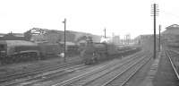 B1 4-6-0 no 61241 with a westbound freight running  between Greensfield and King Edward Bridge Junction in October 1962 passing Gateshead shed. Pacifics on shed include A4 no 60016 <I>Silver King</I> and A1 60145 <I>St Mungo</I>. In the right background is the original 1862 shed at Chaytor's Bank which, following closure, was used as a paint shop by Gateshead Works. <br><br>[K A Gray 06/10/1962]