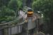 150101 pauses at Saltash en route to Liskeard on 16 September. The view is from the new(ish) footway on the Tamar Bridge and the girders seen here are the west end of the Royal Albert Bridge.<br><br>[Ewan Crawford 16/09/2011]