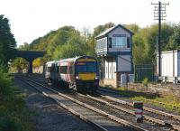 170117 passes Melton Station signalbox on 27 September as it approaches the platform with the 1522 Arriva XC Birmingham New Street - Stanstead Airport service. To the west of here is the junction with the former line to Nottingham, the southern part of which is still in use today as the Alstom test track. <br>
<br><br>[John McIntyre 27/09/2011]