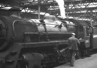 BR Standard Class 4 2-6-0 no 76050 prepares to leave Waverley platform 8 circa 1964. The train is thought to be the 4.10pm to Hawick - extended to Riccarton Junction on Saturdays.<br><br>[David Spaven //1964]