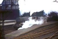 A pair of Black 5s pulling out of Edinburgh's Princes Street station on 24 October 1964 with the 10.10am departure for Birmingham New Street.<br><br>[Frank Spaven Collection (Courtesy David Spaven) 24/10/1964]