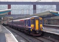 First ScotRail 156446 waits at Carlisle platform 7 with a service to Dumfries on a dismal Saturday afternoon in September 2011.<br><br>[Andrew Wilson 03/09/2011]