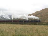 The southbound <I>Jacobite</I> stock working from Fort William to Carnforth pounds away from Arrochar and Tarbet behind two <I>Black 5s</I>. 45407 was leading 44871 and in tow were 9 coaches and a Class 37 diesel. [Photo by Sue Chattwood.]   <br><br>[Malcolm Chattwood 31/10/2011]