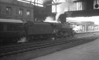 Black 5 no 45148 at Carlisle on 22 February 1964 with the 9.25am Crewe-Perth. <br><br>[K A Gray 22/02/1964]