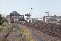 View north at Gorgie Junction in the late spring of 1971 with Gorgie East station behind the camera. The line to the left of the signal box turns west to join the E&G at Haymarket West Junction [see image 36773] with that to the right running to Haymarket Central Junction.<br><br>[Bill Jamieson //1971]