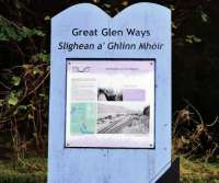 An information board alongside the remains of the platform at the site of Invergarry station in November 2011. The board includes a picture showing the station as it was in the 1930s.<br><br>[John Gray 07/11/2011]