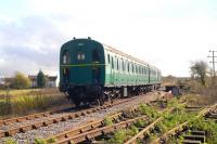 Preserved <I>'Thumper'</I> DEMU no 1302 approaching Blunsdon Station on the Swindon and Cricklade Railway on 12 November 2011.<br><br>[Peter Todd 12/11/2011]