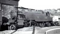 Ivatt 2-6-2T no 41230 stands alongside the turntable at Bangor shed, thought to have been taken in the late 1950s.<br><br>[K A Gray //]